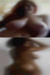 Woman having boobs wide
